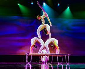 Amazing Acrobats - Grand Shanghai Circus in Branson, MO creating a multi- level pyramid on top of a trampoline.