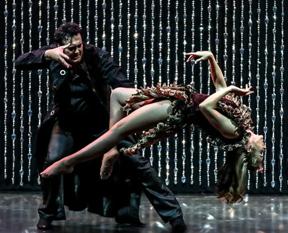 Rick Thomas performing a magic trick that makes one of his assistants float in the air.  Check out our Branson MO Show Schedule to find out when you can see this show.