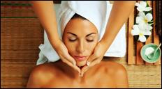 Relaxing facial massage treatment with calming spa setting