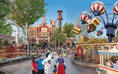 Families strolling through a colorful Branson theme park with festive rides, character encounters, and classic attractions�an engaging destination for a Family vacation Branson MO