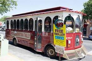 Vintage Branson trolley offering free rides through the historic downtown district
