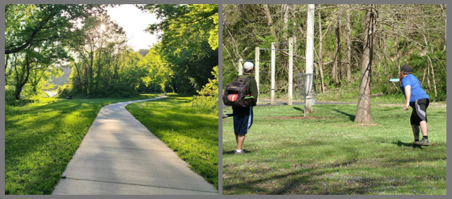 Paved walking trail through a shaded park and visitors enjoying outdoor recreation on open green space.