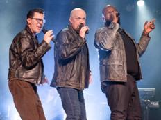 Live vocal trio performing on a Branson theater stage